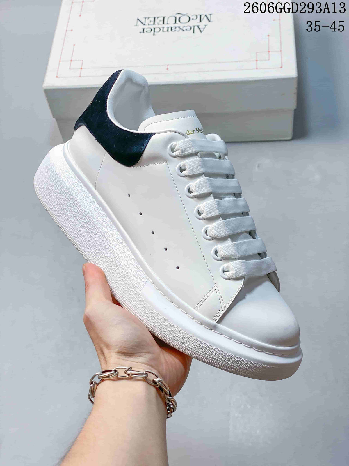 Alexander McQueen White Low-Top Sneakers with Black Heel Tab