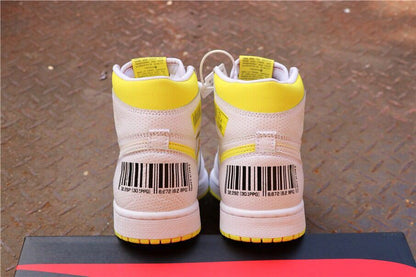 Rear view of white and yellow high-top sneakers with barcode-style heel graphics.