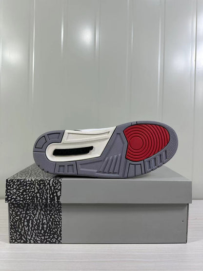 Bottom view showing the grey outsole, red circular traction section, and midsole window.