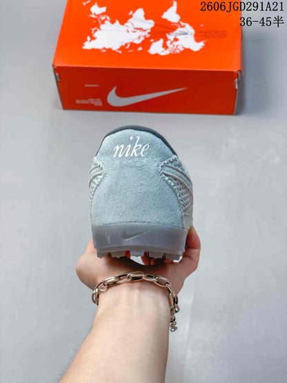 Nike Astrograbber Leather Low-Top Sneakers in Light Blue