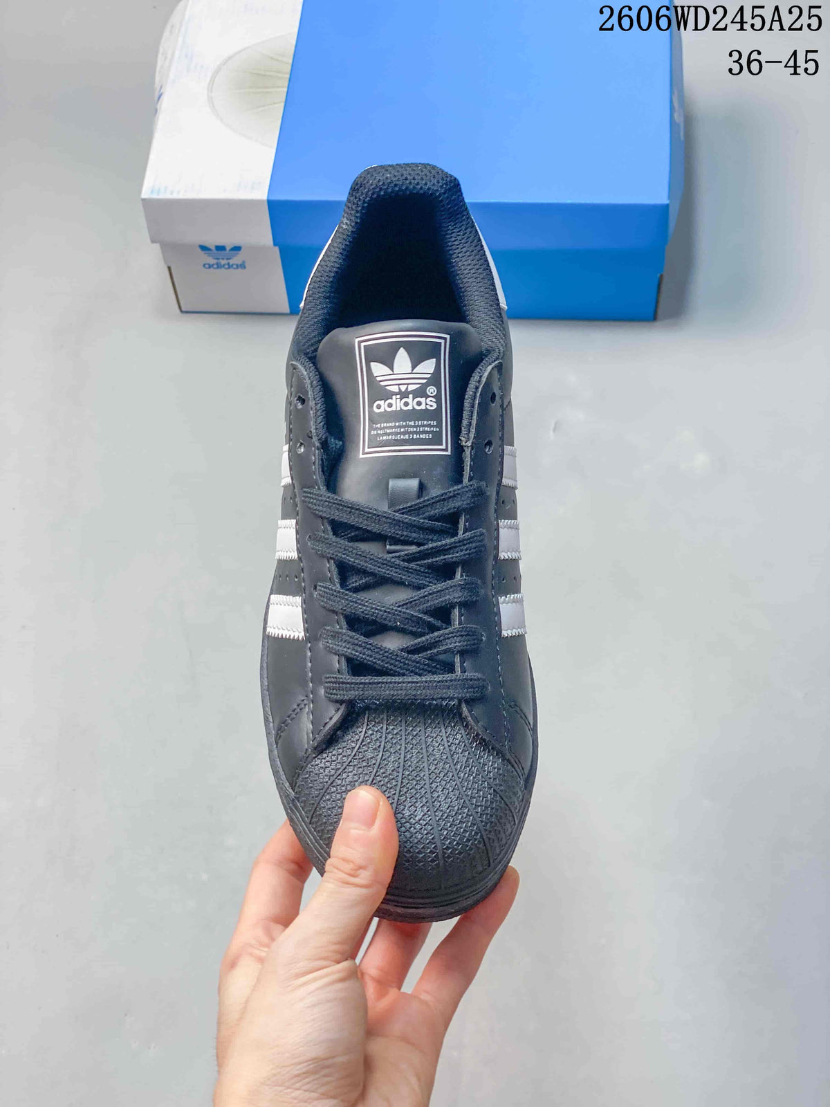 adidas Originals Superstar Low-Top Sneakers in Charcoal and White