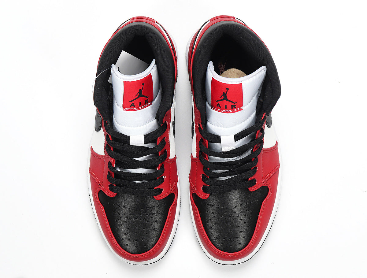 Top view showing the padded collars, tongues, black laces, and contrasting red and white panels