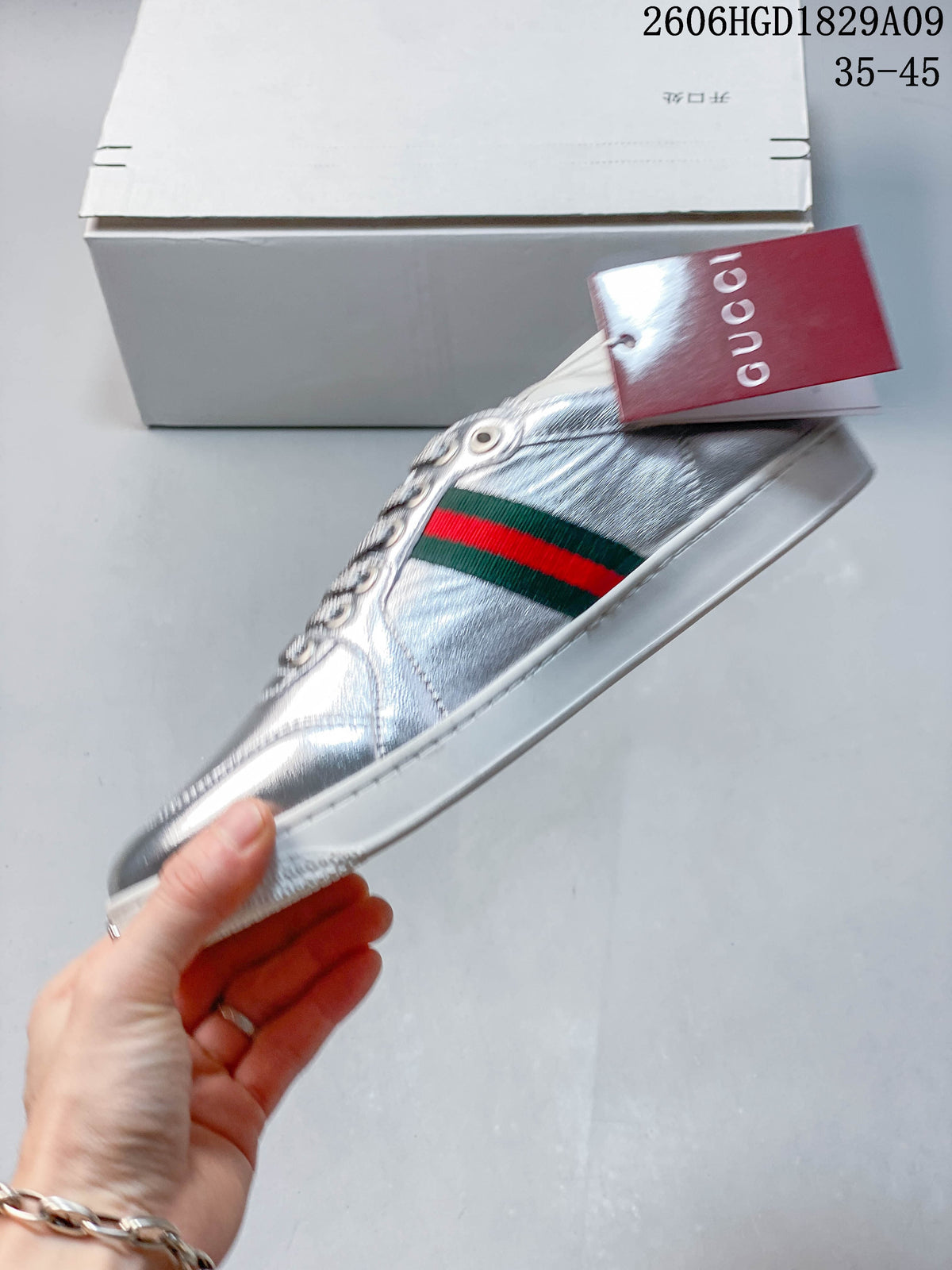 Gucci Silver Low-Top Sneakers with Green-Red Web Stripe