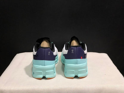 On Cloudmonster Running Shoes in White and Aqua