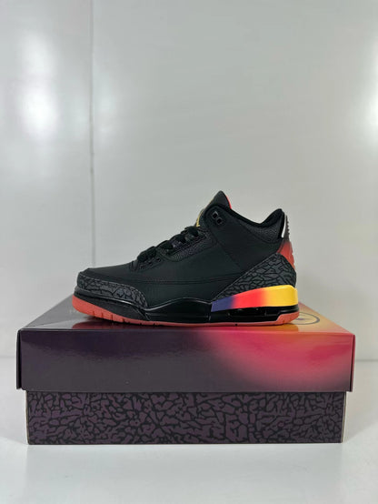 Side profile of one black Air Jordan 3 sneaker with elephant-print overlays and a yellow, red, and purple midsole gradient.
