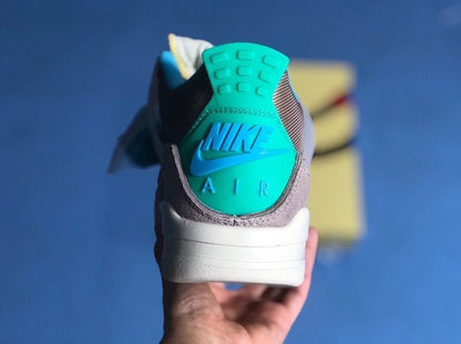 Rear view showing the teal heel tab with raised Nike Air branding.