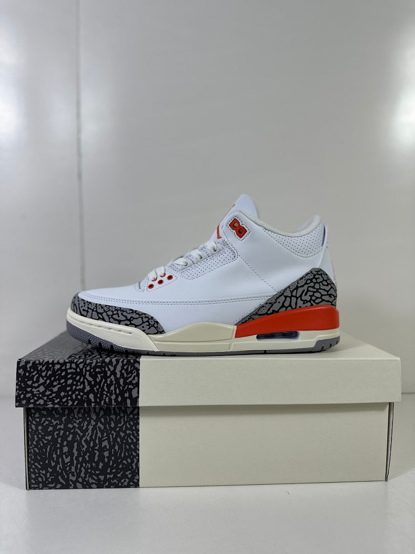 Opposite side profile highlighting the perforated upper, elephant-print toe and heel overlays, and red midsole section.