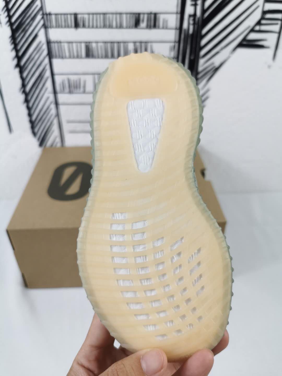 Bottom view showing the translucent outsole pattern and textured tread sections.