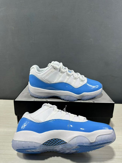 Two white and blue low-top sneakers shown from side and outsole angles, highlighting the glossy blue panels and translucent sole.