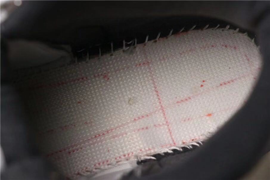Close-up of the stitched interior lining and footbed.