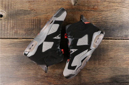 Top-down view of the sneakers showing perforated side panels, grey midsoles, and translucent heel air units.