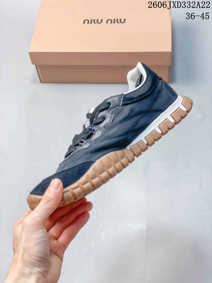 Miu Miu Tyre Low-Top Sneakers in Gray and Navy