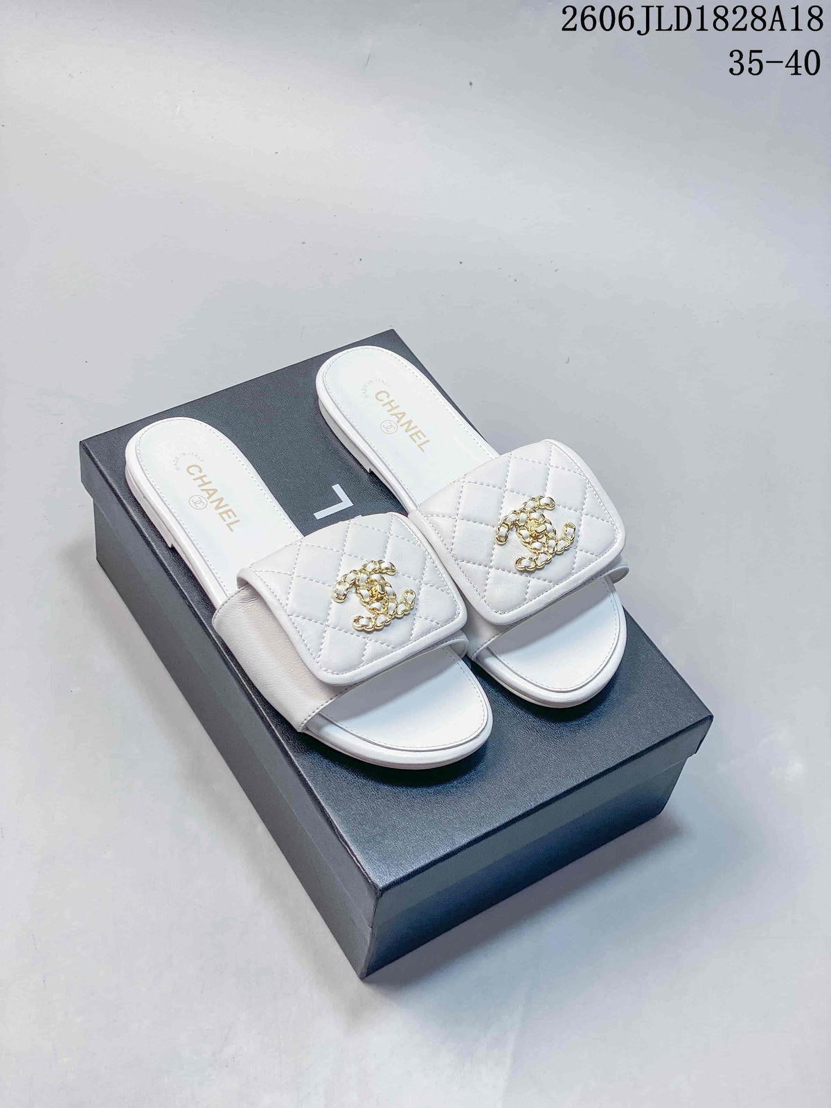 Chanel Quilted Double-C Slide Sandals, Black and White