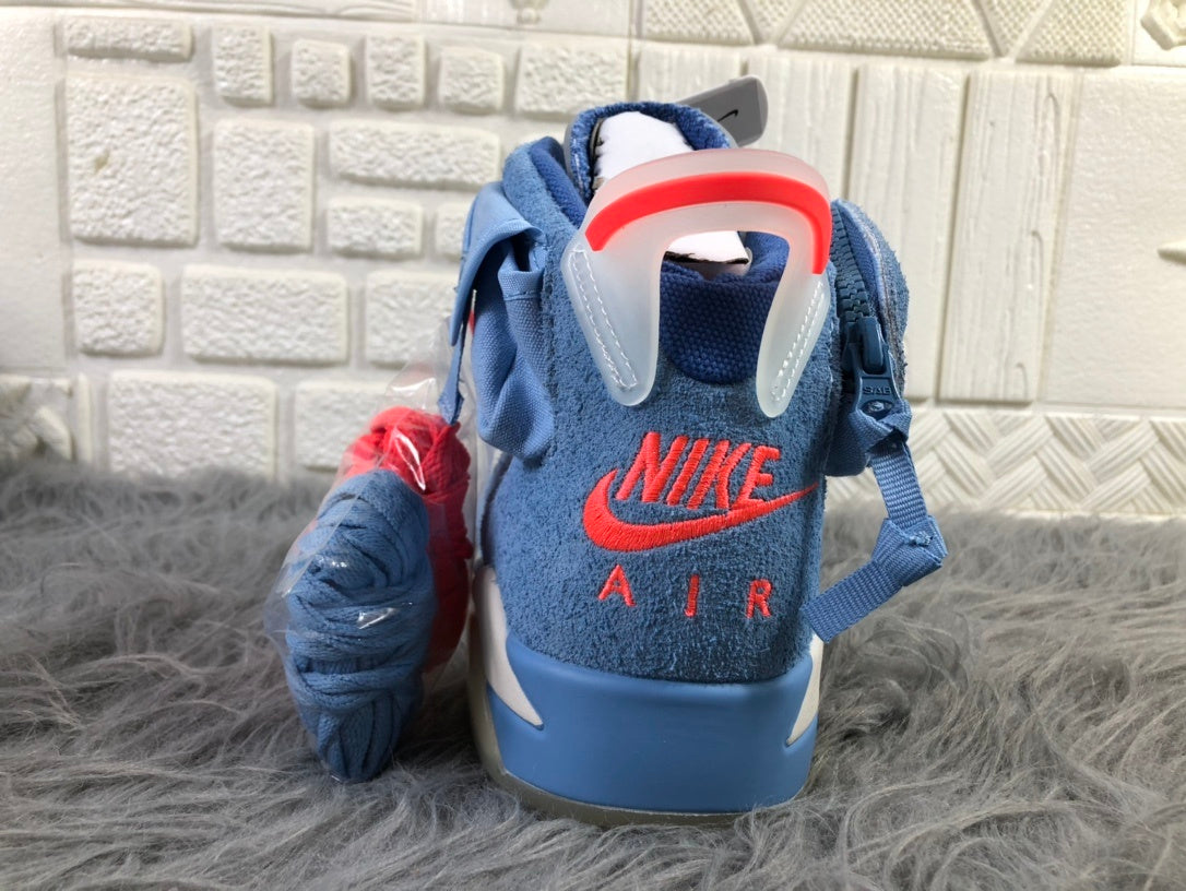 Rear view showing the red heel branding, pull tab, and ankle construction.