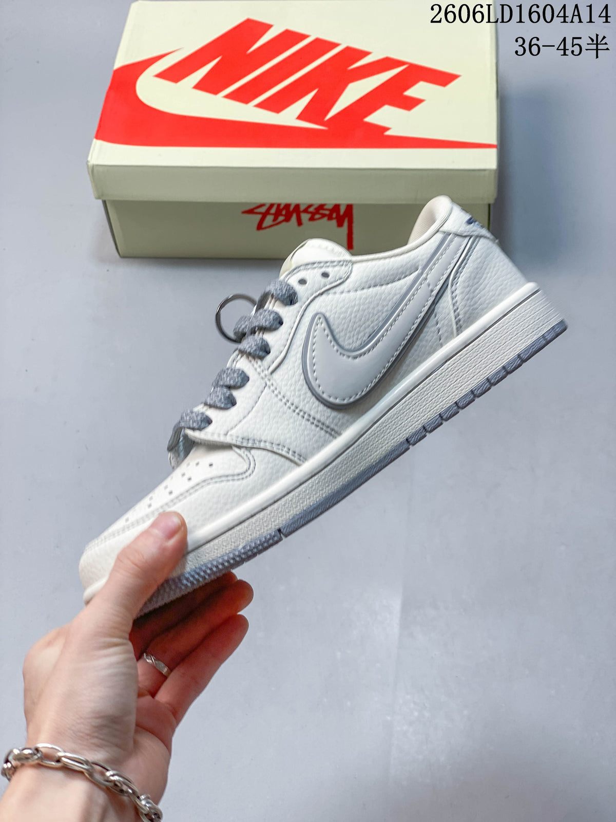 Travis Scott x Jordan 1 Low Sneakers in Ivory and Gray