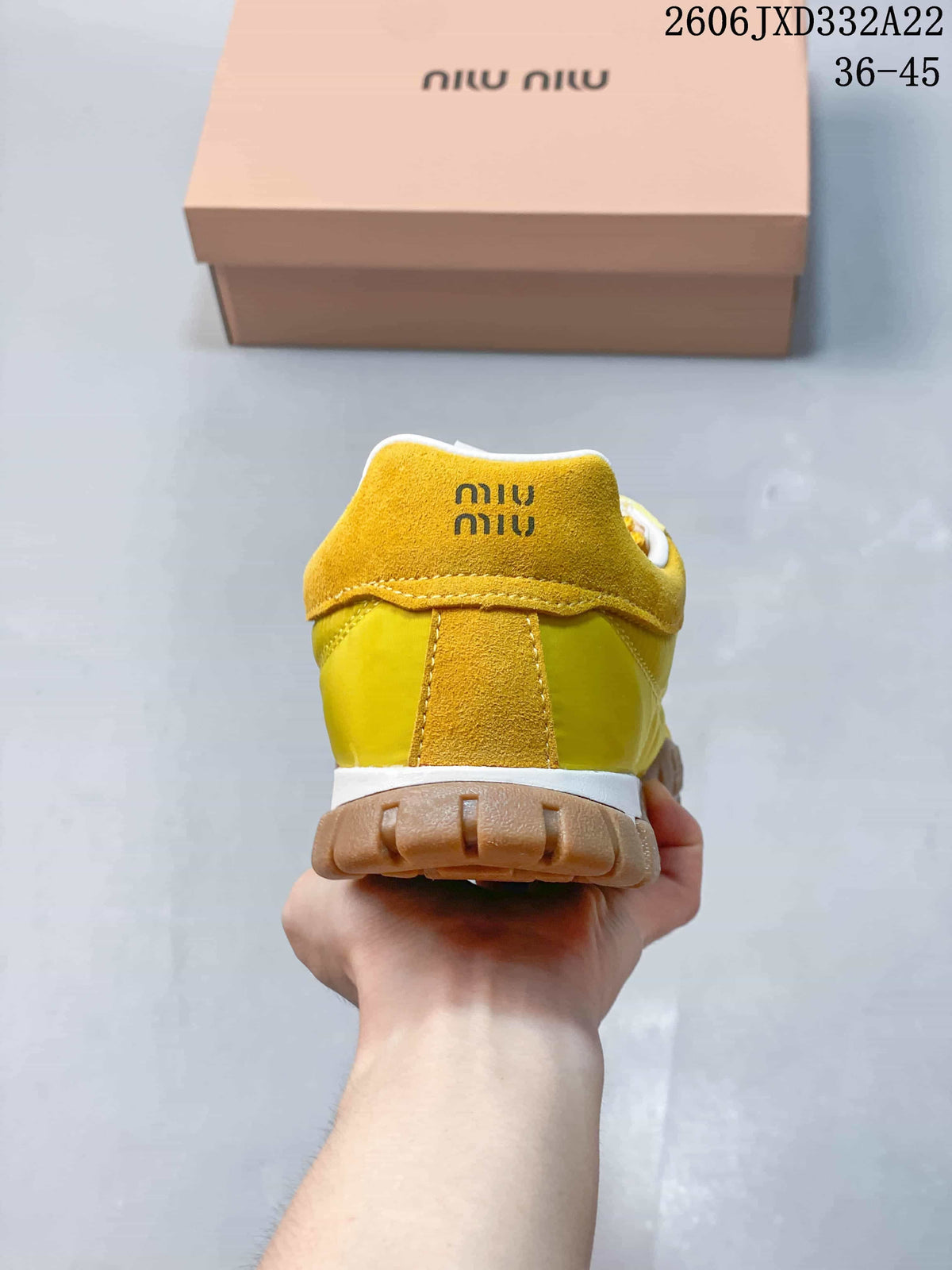 Miu Miu Tyre Low-Top Sneakers in Yellow