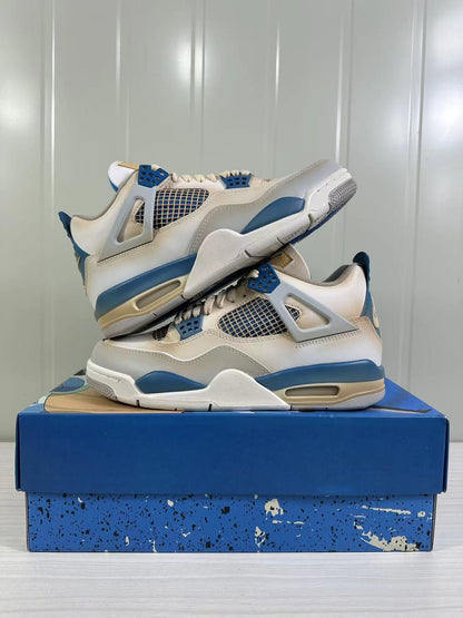 The two sneakers arranged one above the other to show their side profiles and blue accents.