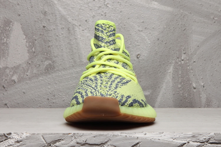 Front view showing the woven patterned upper, matching laces, and rounded toe.