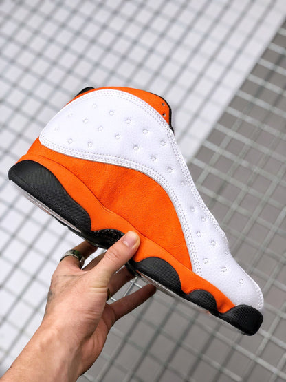 Close side view highlighting the white perforated panel and orange accents
