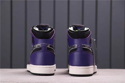 Rear view showing the purple heel panels, black collars, patterned overlays, and white midsoles.