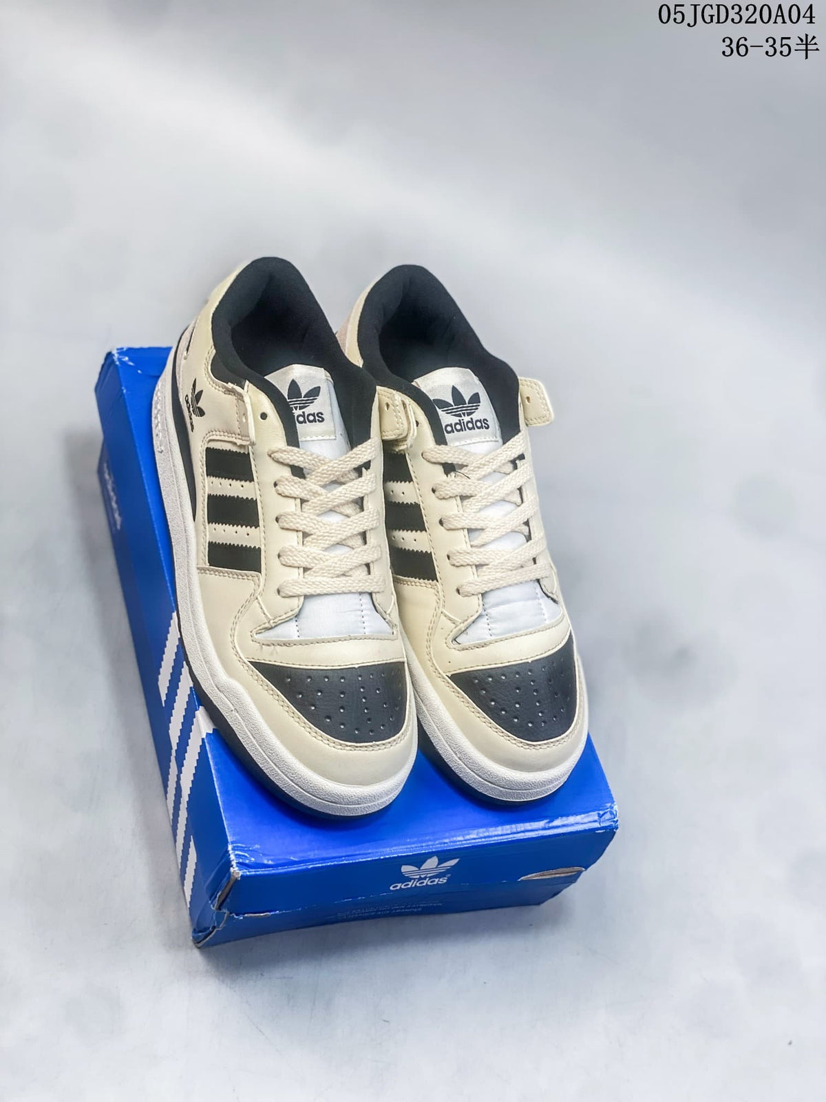 Adidas Originals Forum 84 Low Sneakers in Cream and Black