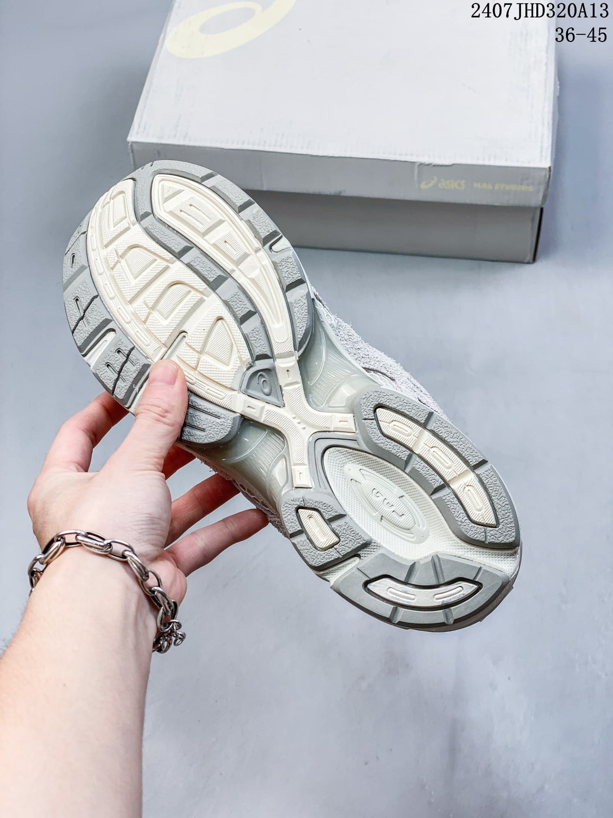 ASICS GEL-1130 Retro Running Sneakers in Cream and Gray