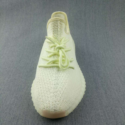 Top view showing the lace arrangement, textured toe box, and rounded sneaker shape.