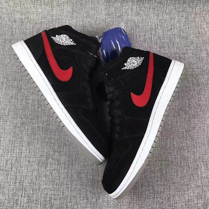 Top-down view of the pair with red Swooshes and an additional blue lace bundle in packaging.