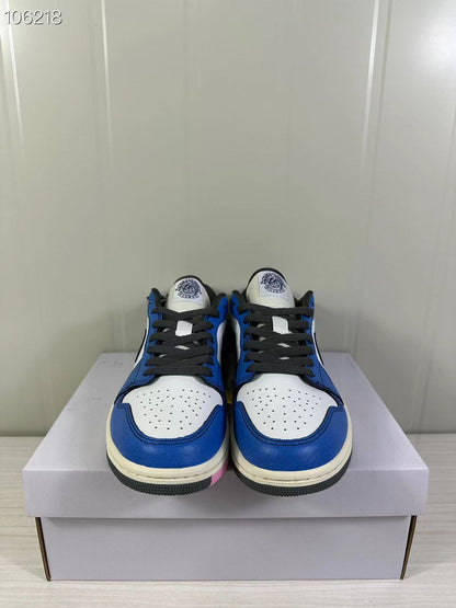 Front view of the pair showing black laces, blue overlays, and perforated white toe panels.