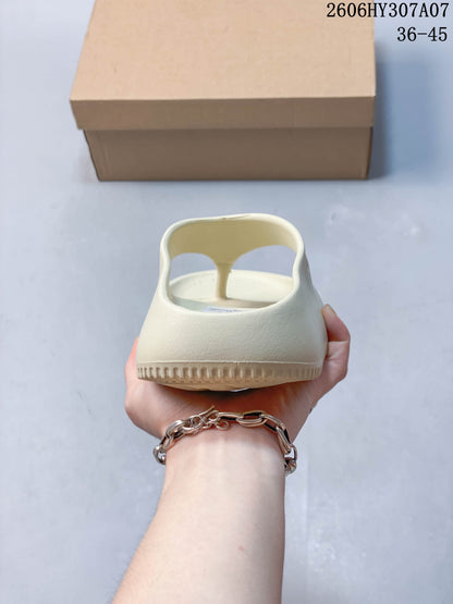 Nike Calm Slide Thong Sandals in Cream