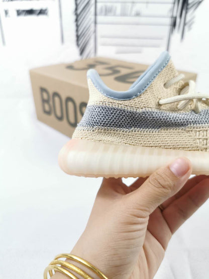 Side and heel detail showing the gray stripe, padded collar, and translucent ribbed outsole.