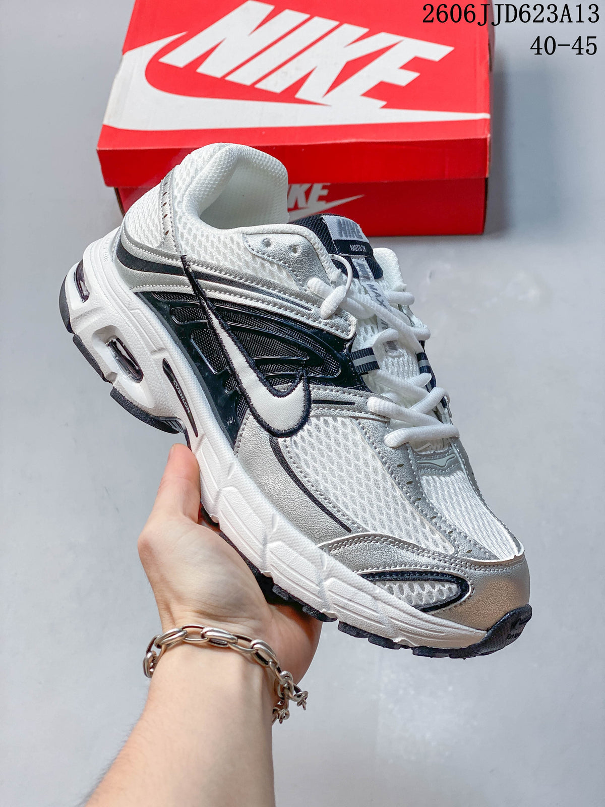 Nike Air Max Moto 2K Low-Top Running Sneakers