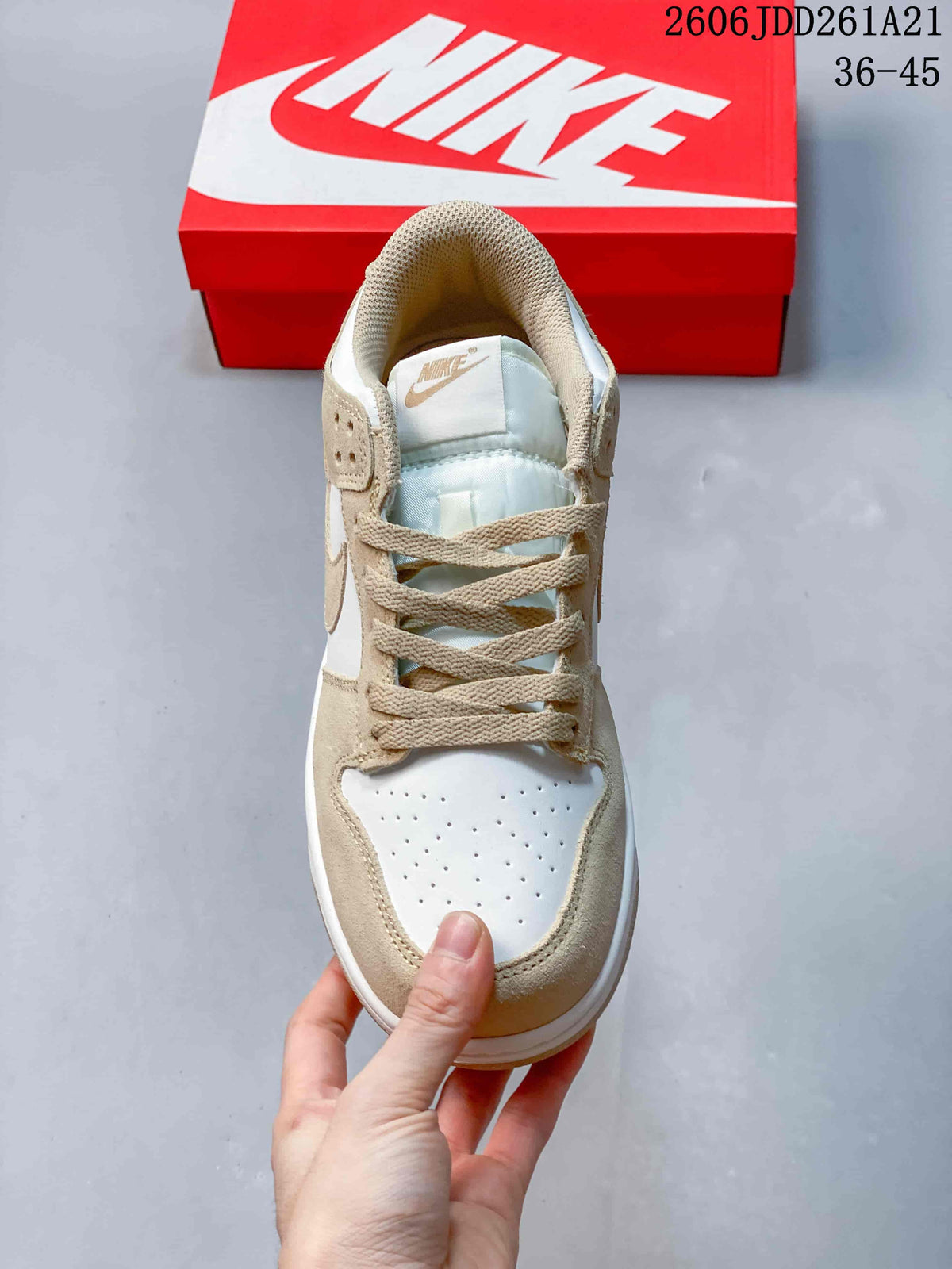 Nike Dunk Low Sneakers in White and Beige
