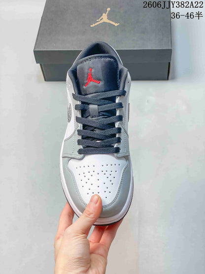 Jordan Air Jordan 1 Low Sneakers in White and Grey