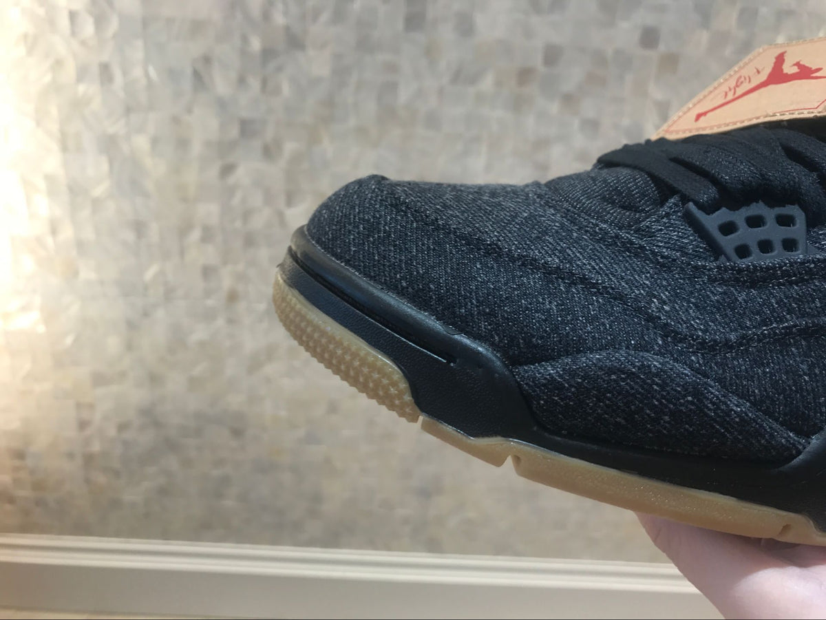 Close-up of the black toe, sidewall and gum-colored outsole.
