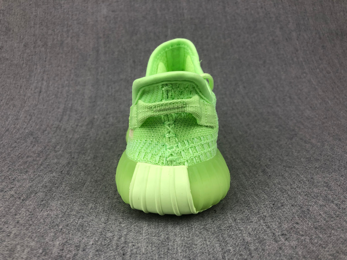 Rear view showing the padded collar, heel tab, and ribbed translucent sole.
