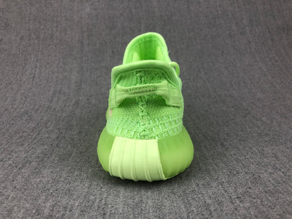 Rear view showing the padded collar, heel tab, and ribbed translucent sole.