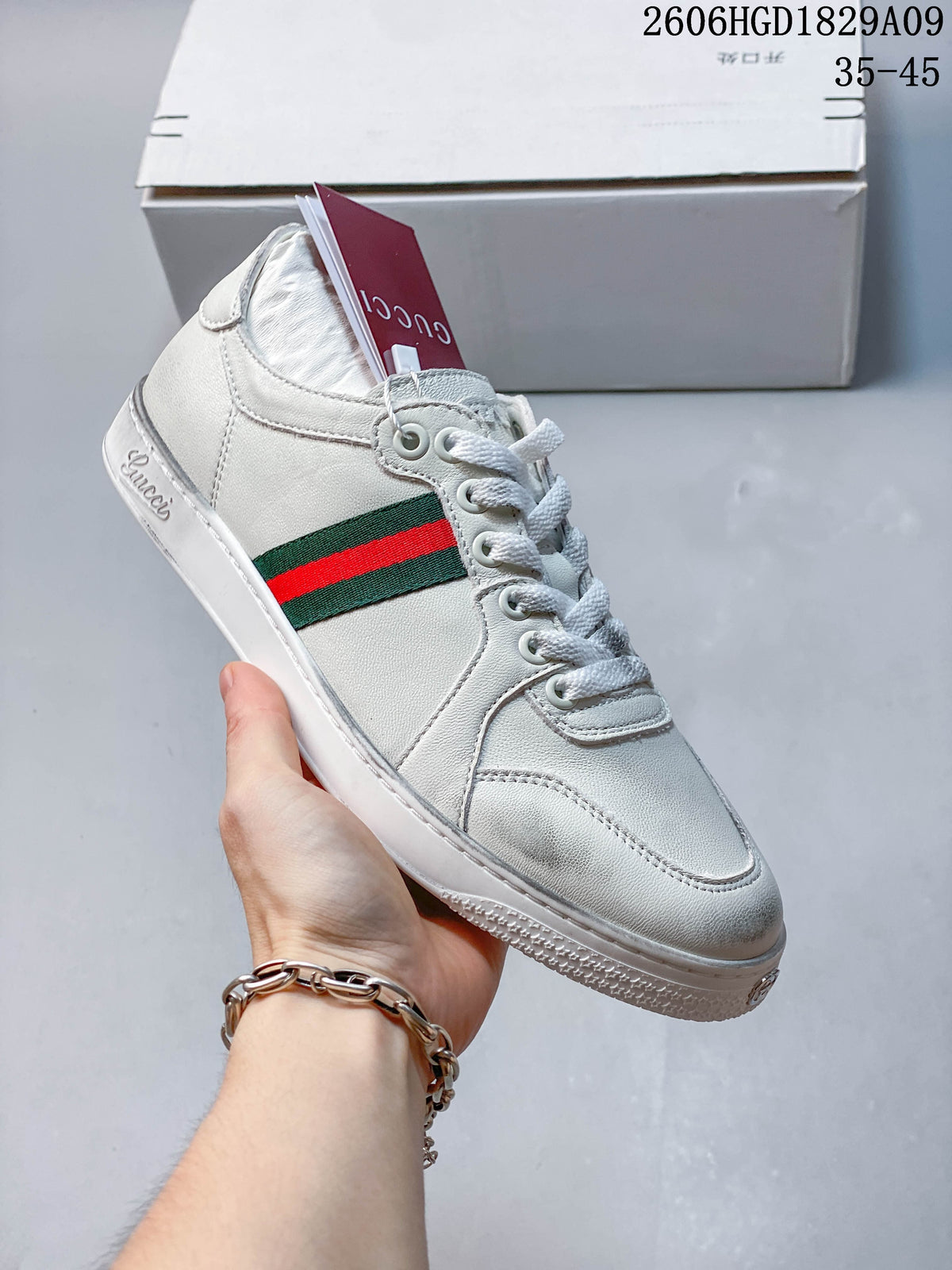 Gucci White Low-Top Sneakers with Red-Green Web Stripe