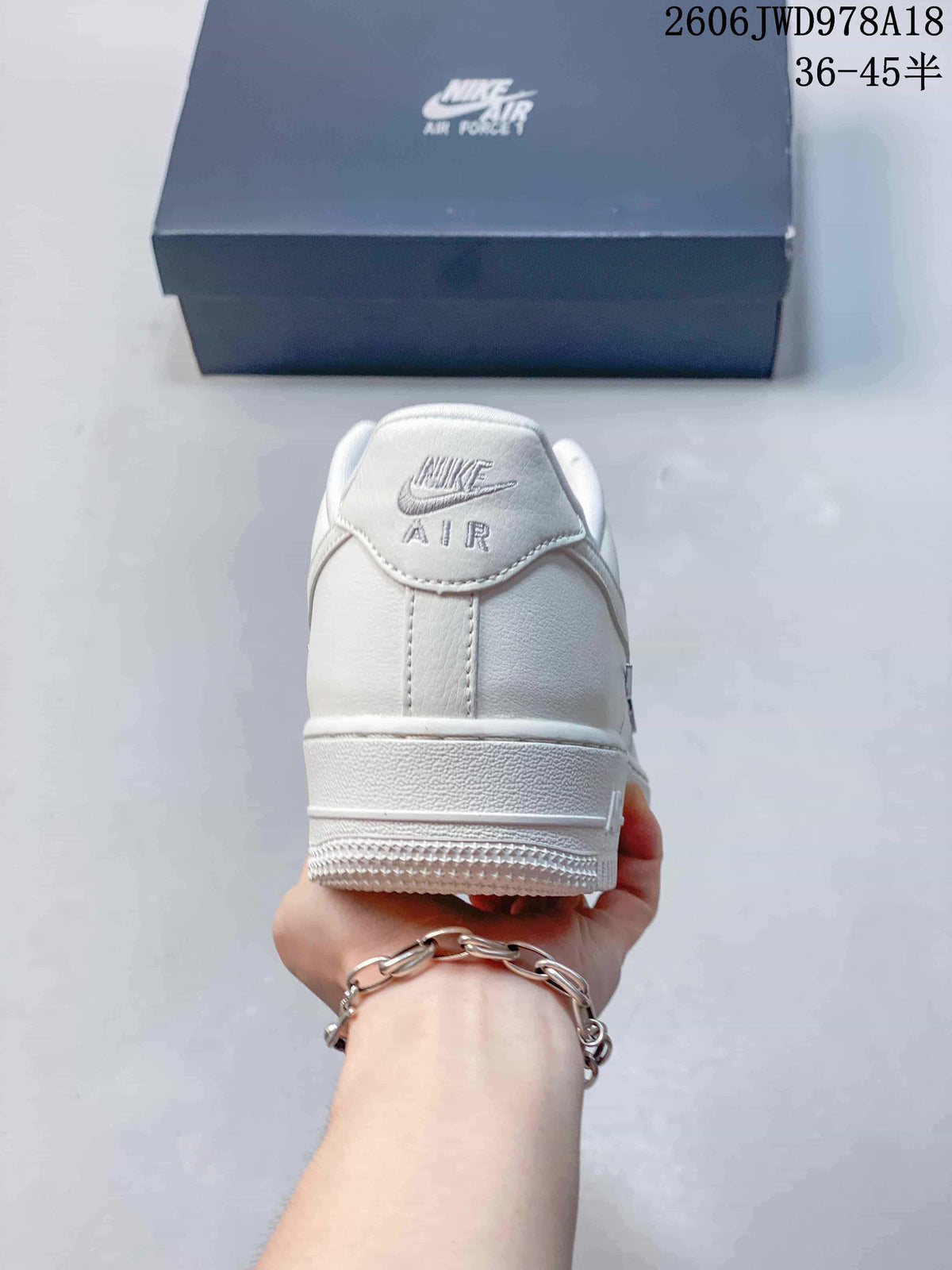 Nike Air Force 1 Low White Sneakers with Metallic Accents