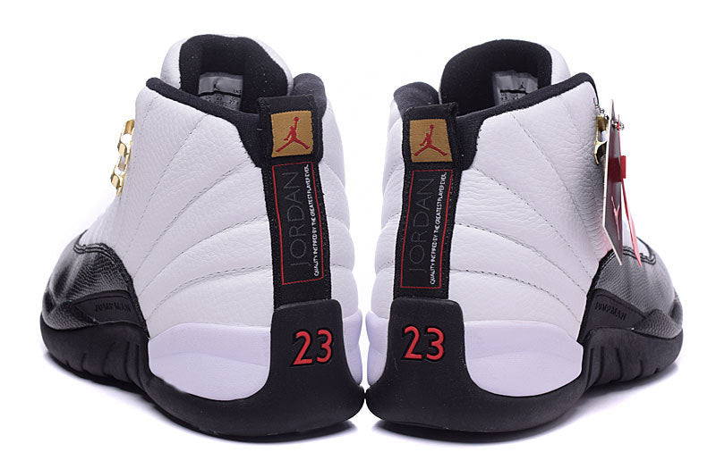 Rear view of the pair showing the segmented white heel panels, black heel tabs, red 23 graphics, and Jordan branding.