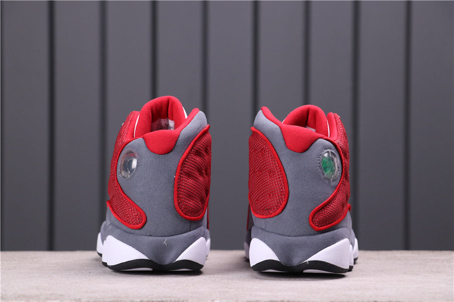 Rear view of the pair showing red and gray heel details.