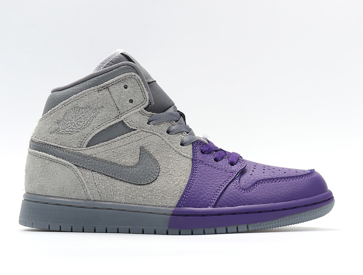 Opposite side profile showing the grey and purple color blocking and ankle branding.