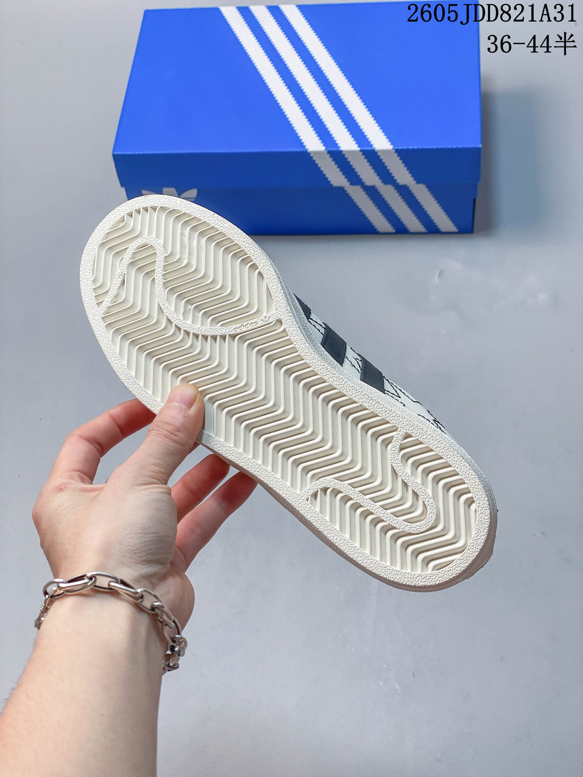 Adidas Superstar White Sneakers with Black Stripes