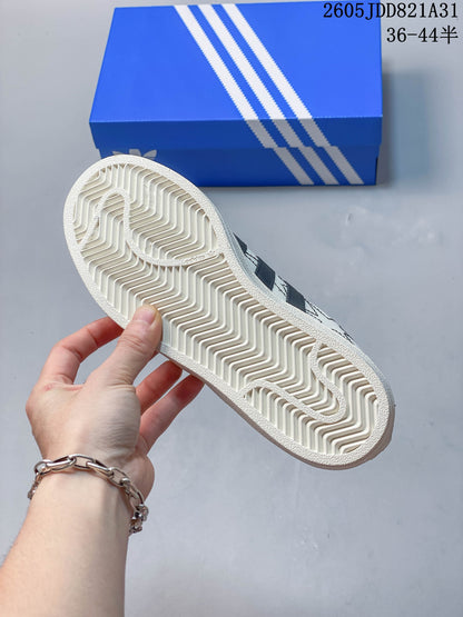 Adidas Superstar White Sneakers with Black Stripes