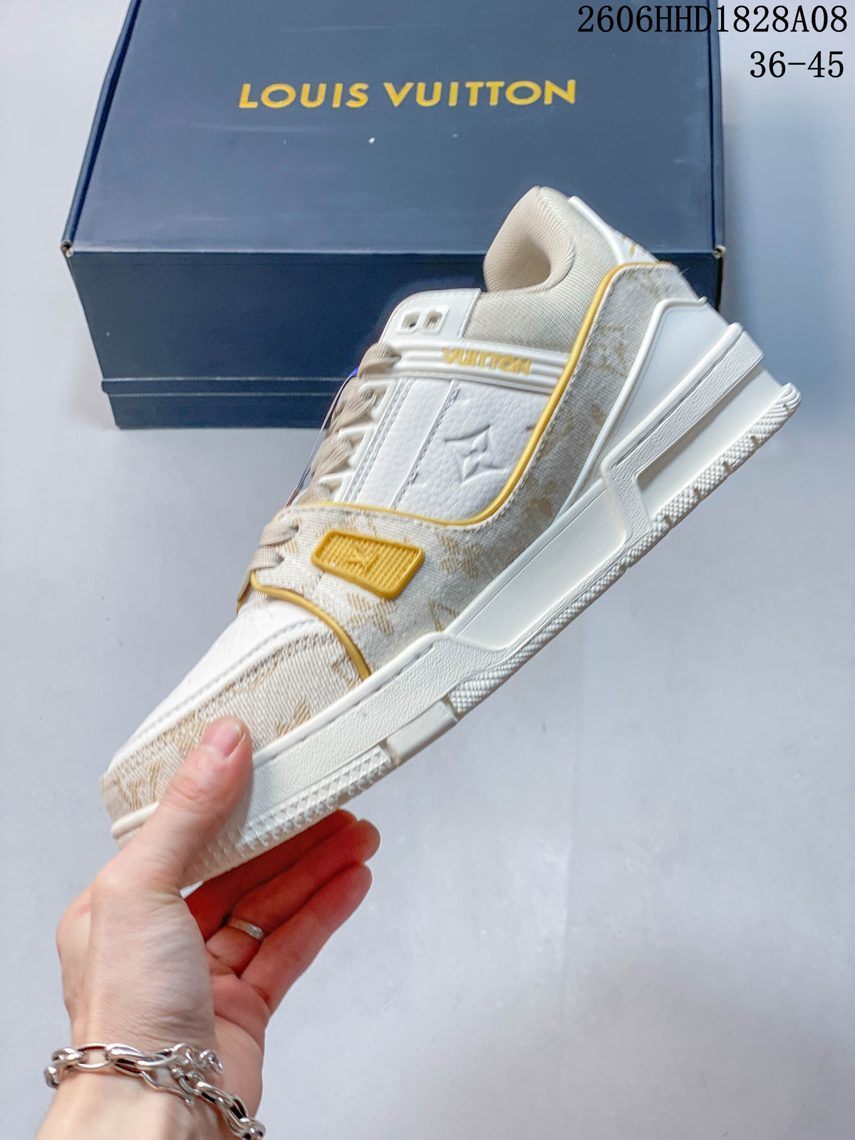 Louis Vuitton Archlight Low-Top Sneakers in White and Gold