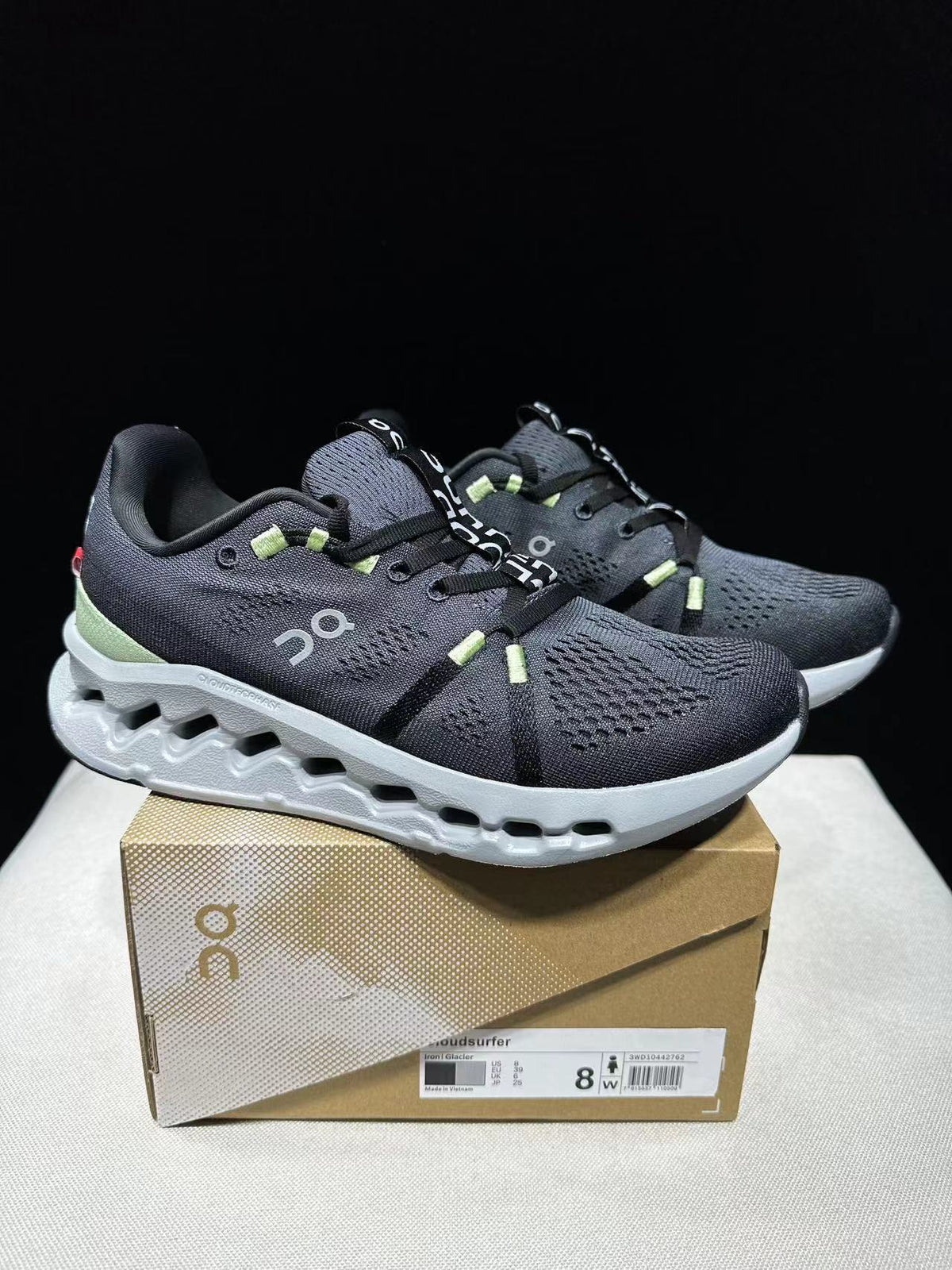 On Cloudsurfer Running Shoes in Black and Glacier