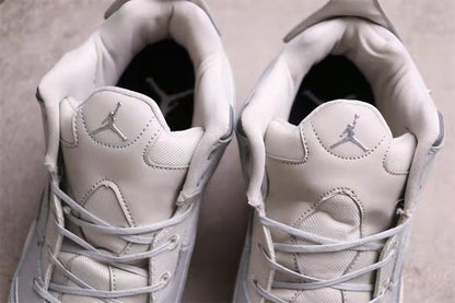 Top view showing the padded tongues, collars, and metallic tongue logos.
