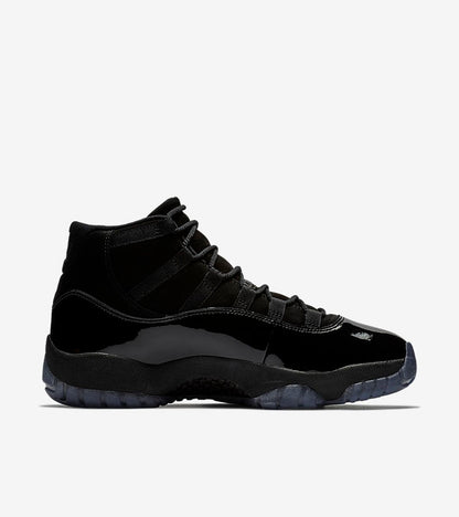 Studio side profile of a black high-top sneaker on a white background.