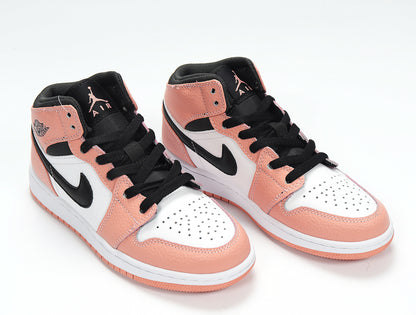 Three-quarter view of the mid-top sneakers with quartz pink panels, white side sections, black Swooshes, and black laces.