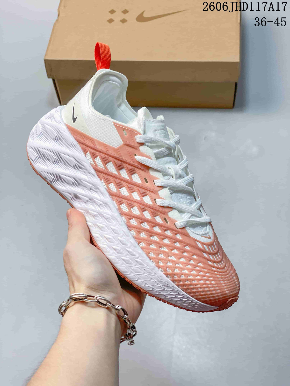 Nike Ava Rover Low-Top Sneakers in White and Coral